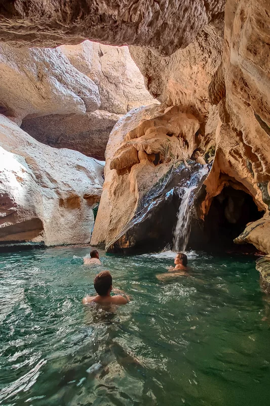 Cave with waterfall at the end of Wadi Shab